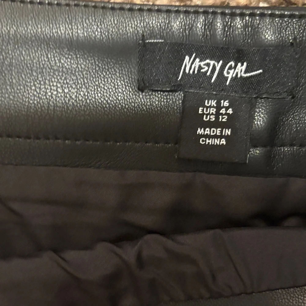 Nasty Gal Black Mini Skirt with Star Details - Picture 2 of 3